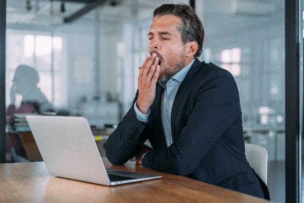  Man yawning at work