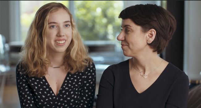  Mother and daughter discussing positive sleep apnoea therapy experience at home
