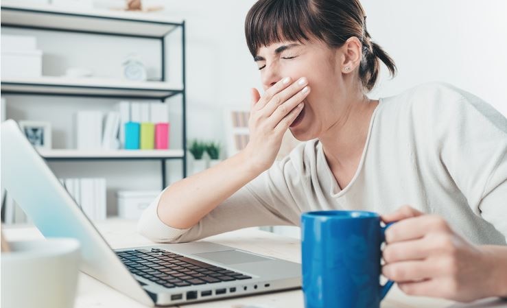 Yawning tired lady with sleep apnoea ResMed UK